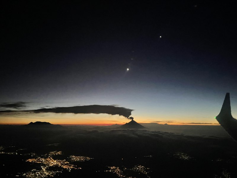 Venus has returned as a brilliant morning star. From a window seat on a flight to Mexico City, the bright celestial beacon was captured just before sunrise in this astronomical snapshot, taken on September 12. Venus, at the upper right, shared the early predawn skies with an old crescent Moon. Seen from this stratospheric perspective, both mountain peaks and clouds appear in silhouette along a glowing eastern horizon. The dramatic, long, low cloud bank was created by venting from planet Earth's active volcano Popocatépetl.