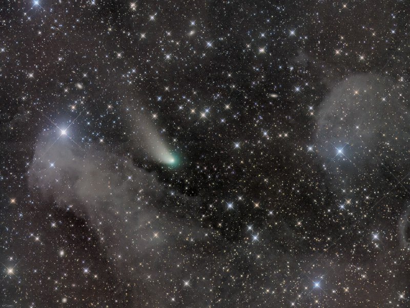 Outbound Comet ZTFFormer darling of the northern sky Comet C/2022E3 (ZTF) has faded. During its closest approach to our fair planet in early February Comet ZTF was a mere 2.3 light-minutes distant. Then known as the green comet, this visitor from the remote Oort Cloud is now nearly 13.3 light-minutes away. In this deep image, composed of exposures captured on March 21, the comet still sports a broad, whitish dust tail and greenish tinted coma though. Not far on the sky from Orion's bright star Rigel, Comet ZTF shares the field of view with faint, dusty nebulae and distant background galaxies. The telephoto frame is crowded with Milky Way stars toward the constellation Eridanus. The influence of Jupiter's gravity on the comet's orbit as ZTF headed for the inner solar system, may have set the comet on an outbound journey, never to return.
